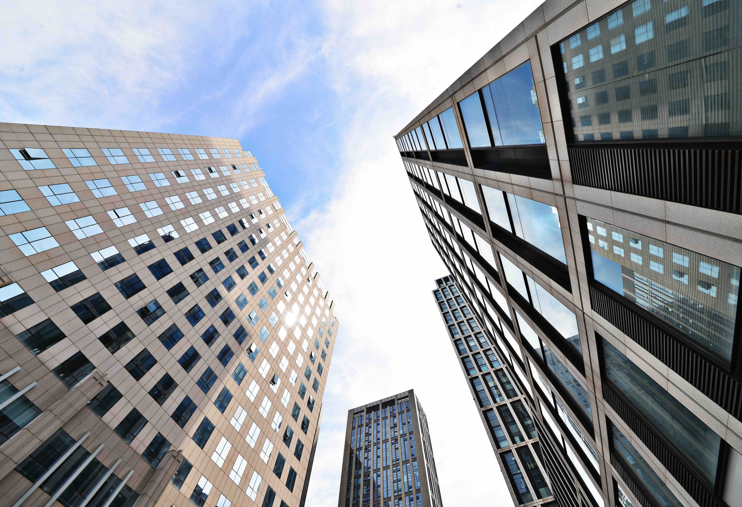 Looking up at business buildings in downtown New York, USA